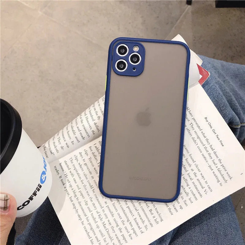 Transparent solid-colour shockproof iPhone case showing soft TPU sides and hard PC back, compatible with multiple models.