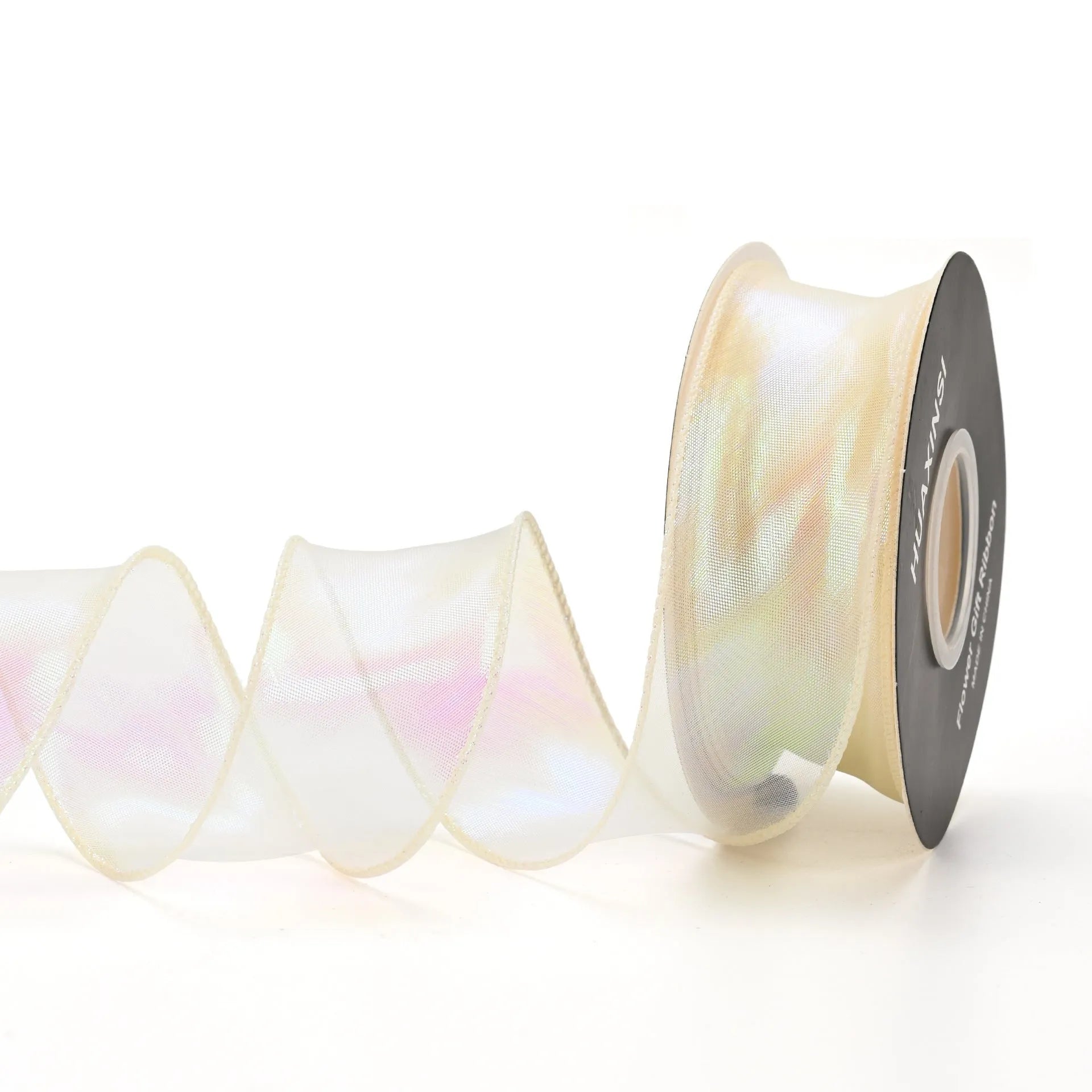 Roll of colourful fishtail yarn mesh decorative ribbon showing wave texture and multiple colour options