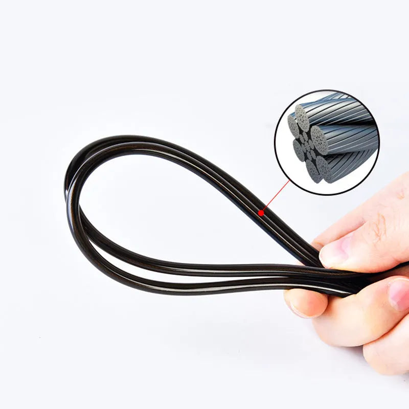 Steel wire skipping rope with black foam handles on a flat surface, showing 3m length and 4mm rope diameter