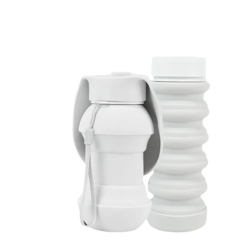 Outdoor pet folding drinking cup made from silicone, with a short and long option, on a white surface