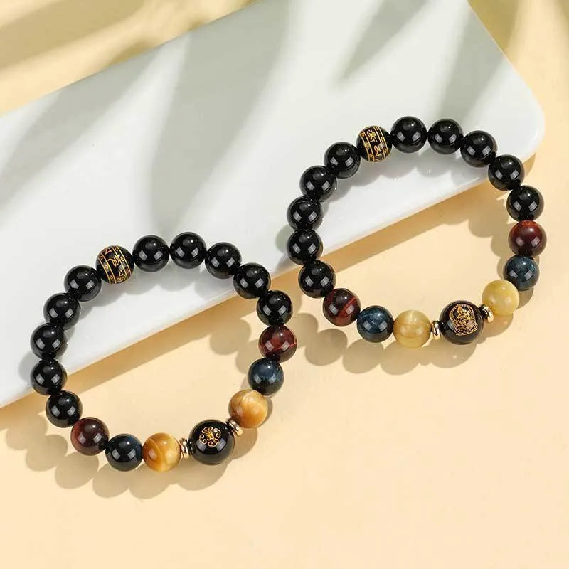 Handmade black agate beaded bracelet with Buddhist carving and tiger eye gemstones