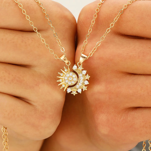 Two copper sun and moon magnetic pendant necklaces on a white background, clavicle chain length, set for couples