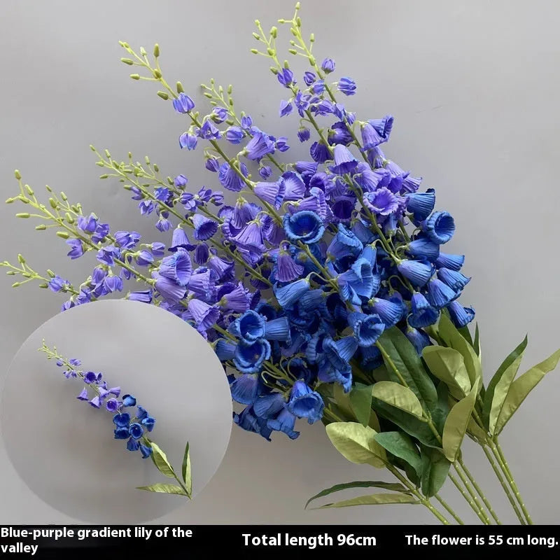 Blue haze artificial silk flower bouquet arranged for decorative display