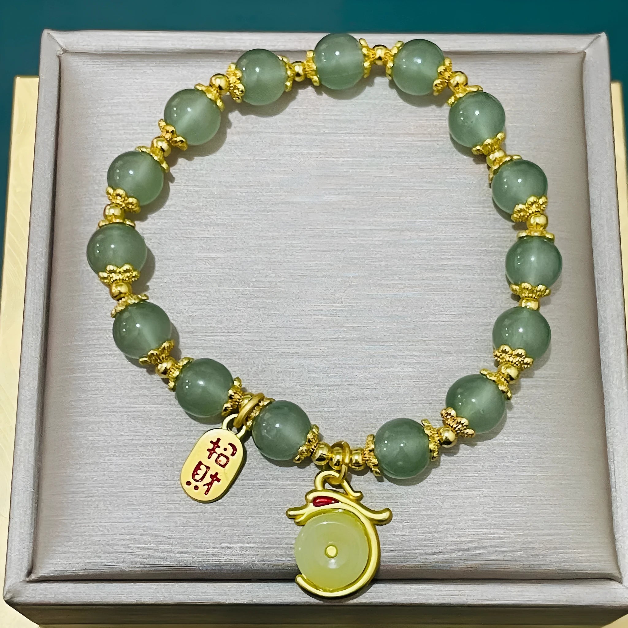 Coloured glass bracelet with rabbit motif in national style design for unisex wear