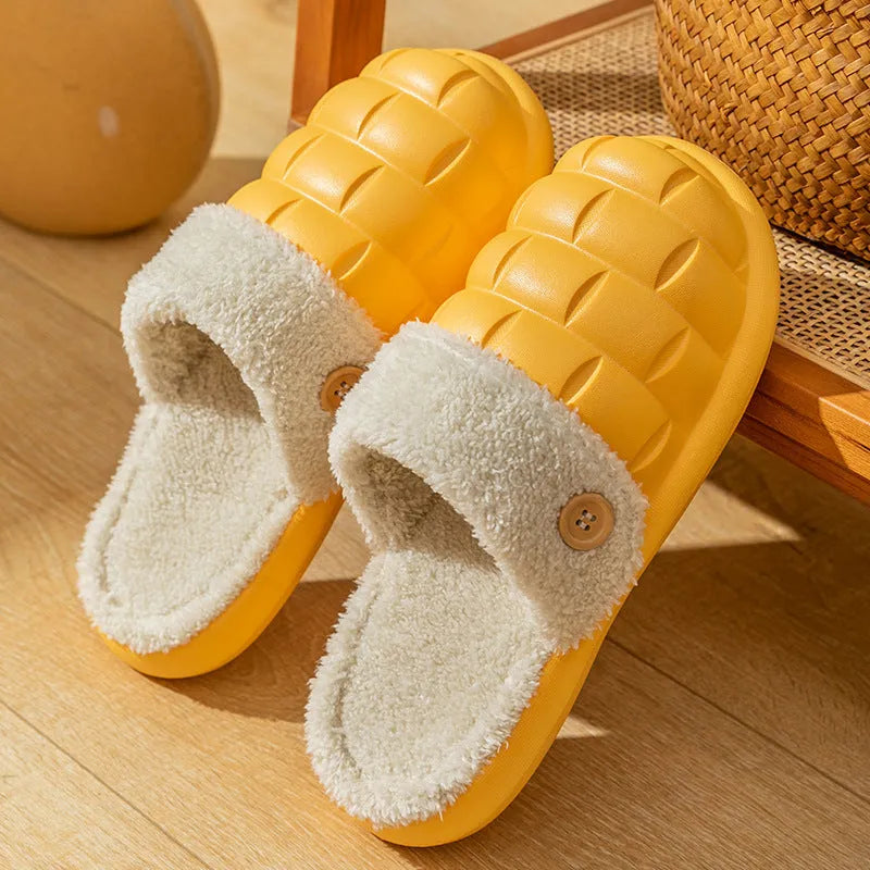 Plaid detachable slippers for women with plush lining and EVA sole in pink, shown on a wooden floor.