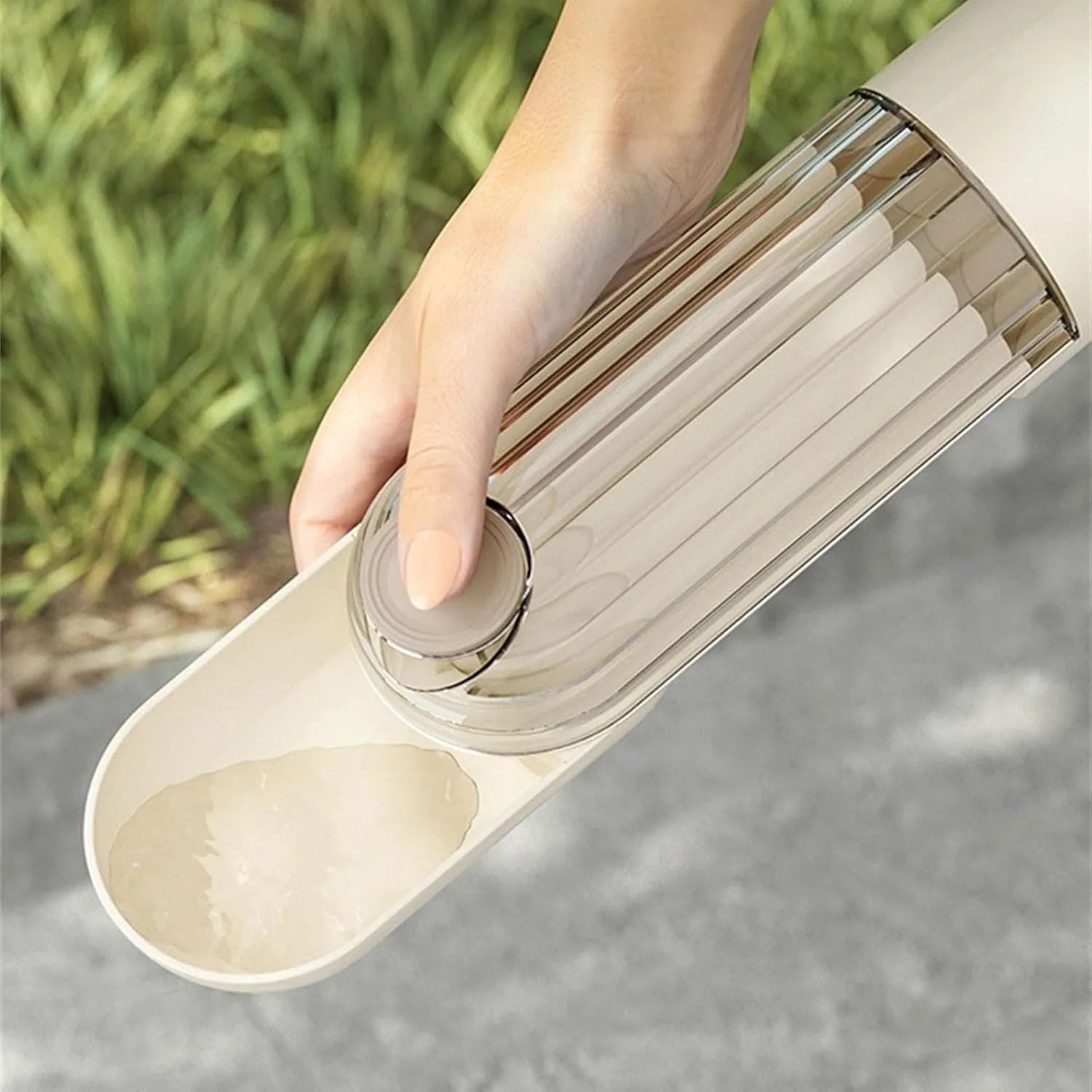Foldable dog water bottle with food container in beige colour for walking and hiking with pets