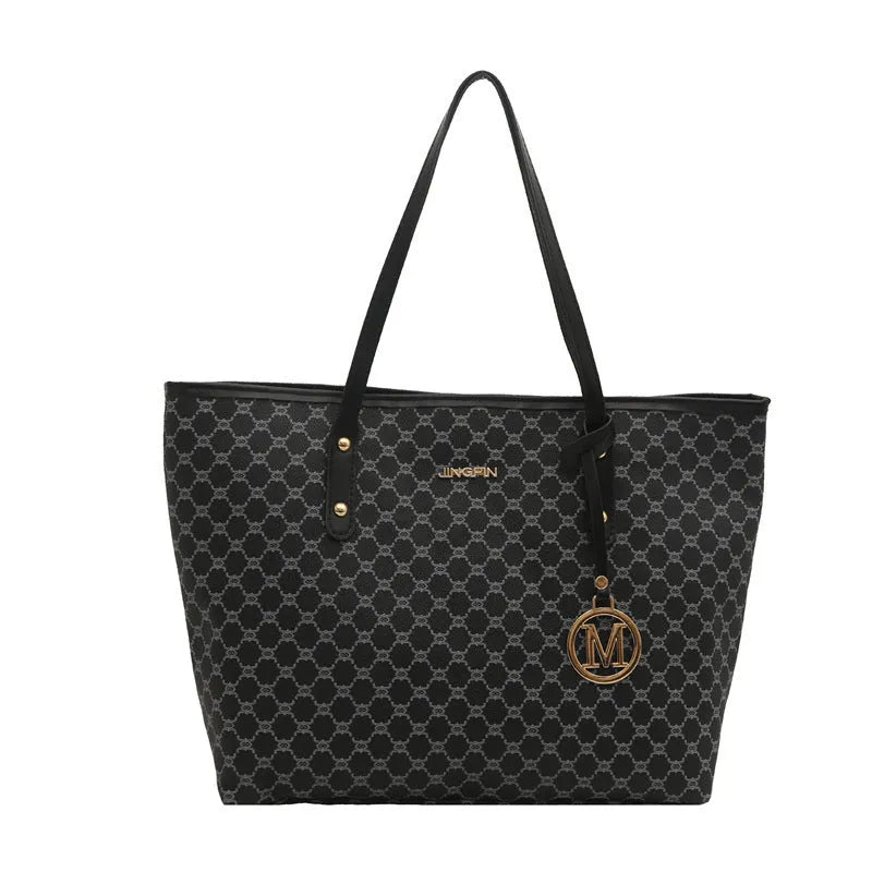 Women's structured PU leather shoulder bag in street-trend style with sewing thread detail.