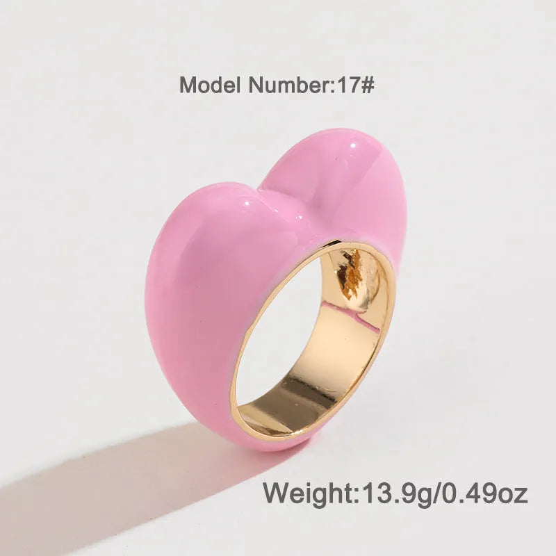 Three-dimensional enamel heart ring in zinc alloy showing raised design detail