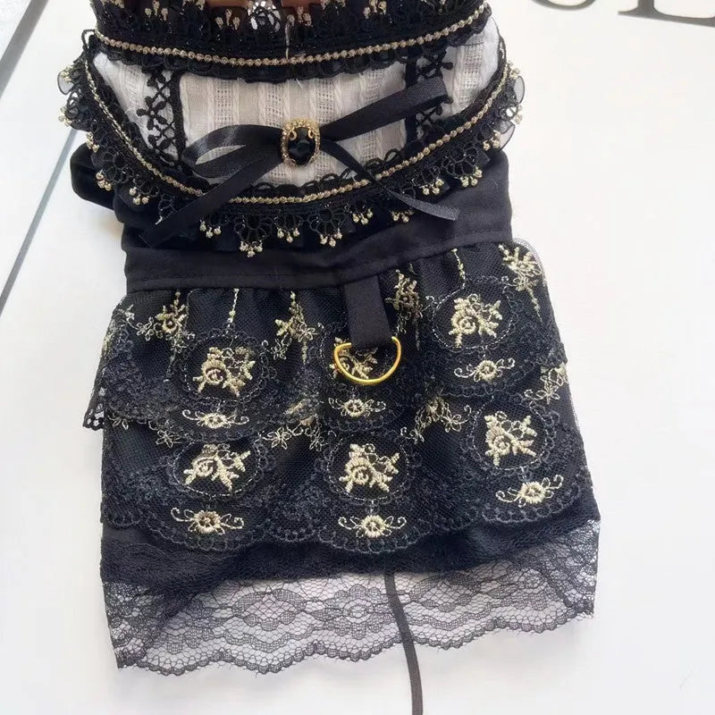 Golden gothic-style skirt dress for cats or dogs on a mannequin showing princess design and polyester fabric
