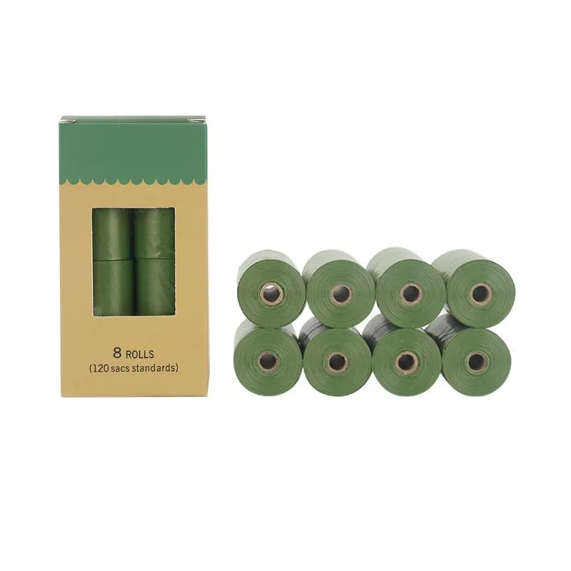 Green roll of EPI degradable thickened pet poop bags next to a green dispenser unit on a white background.