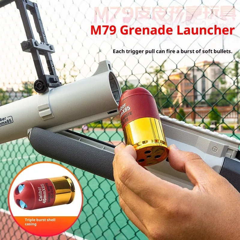 Three-piece Golden Ring Howitzer children's toy soft bullet gun set with plastic construction, includes gun, 20 bullets, and sling