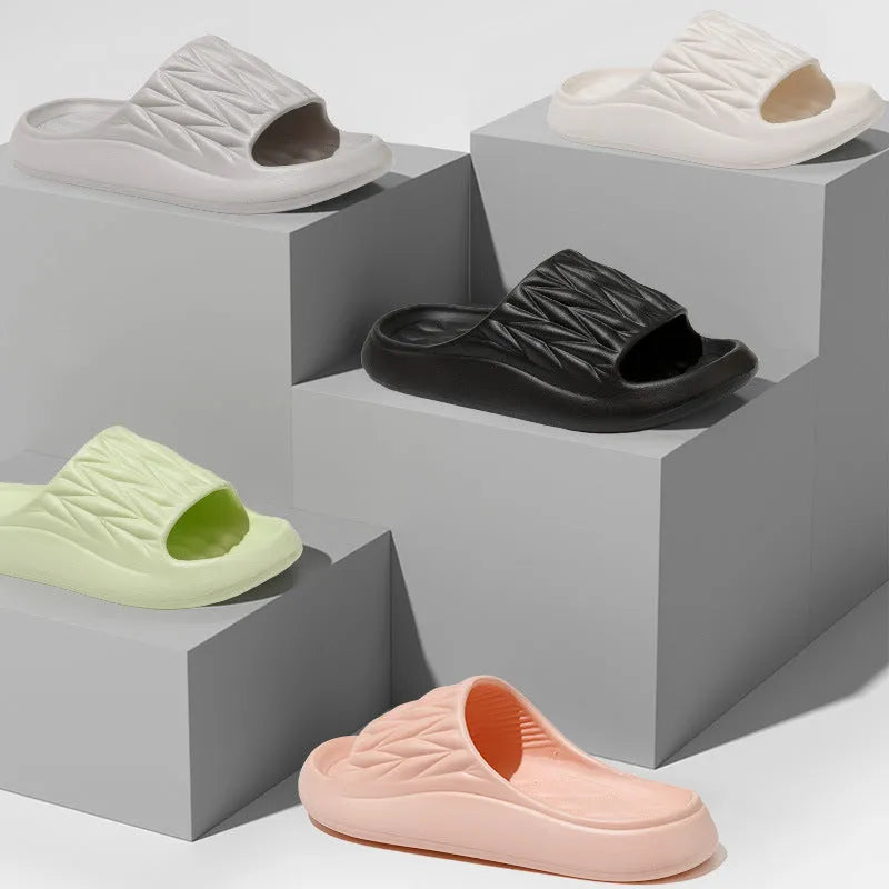 Leaf texture design EVA slippers for indoor summer and bathroom use.