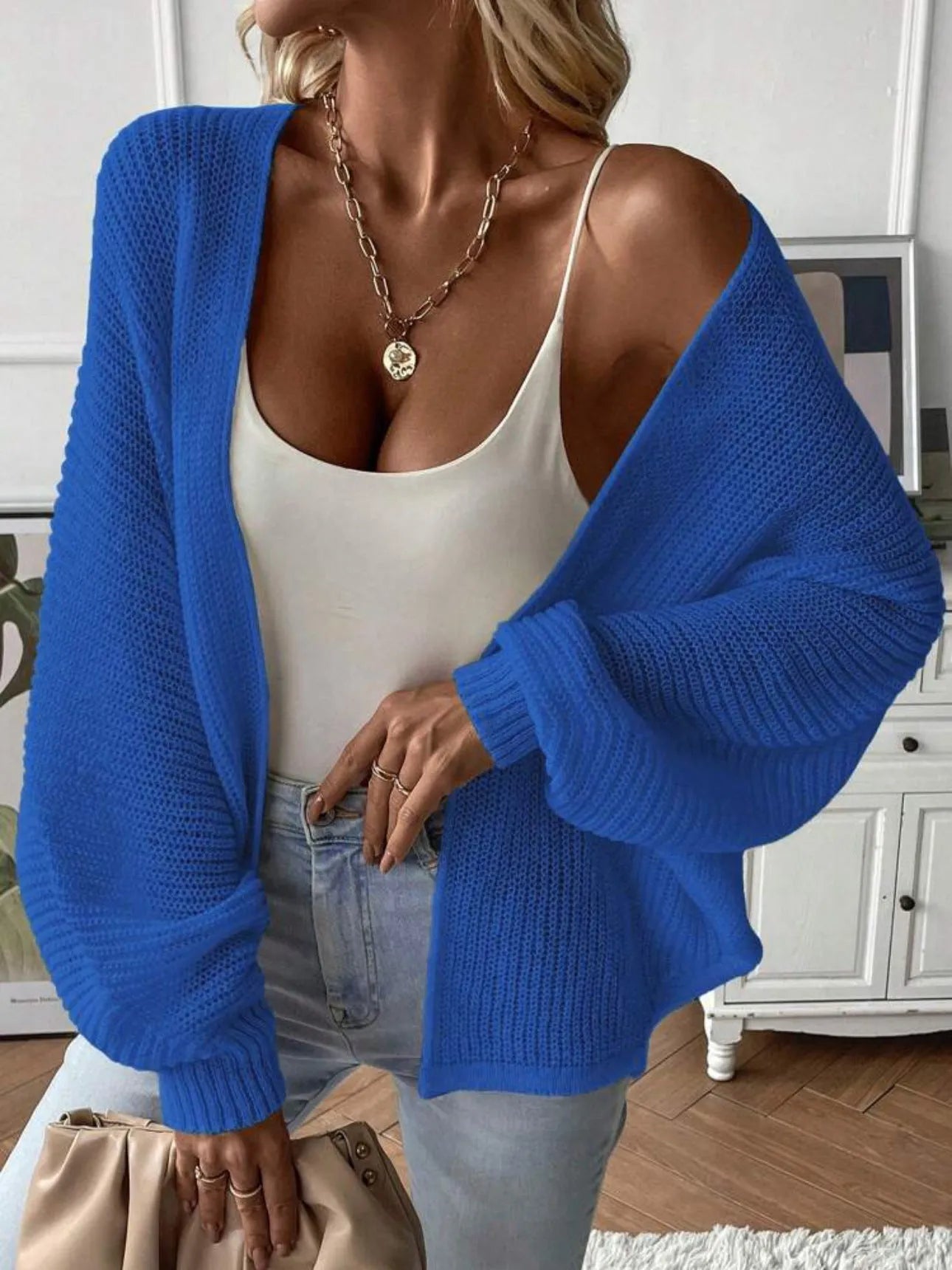 Polyester batwing sleeve cardigan in loose fit available in five solid colours