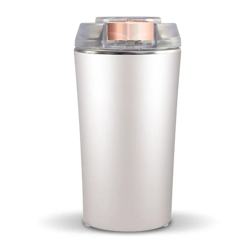 Blue mini flour mill and grinder machine with stainless steel construction for grinding spices and grains.