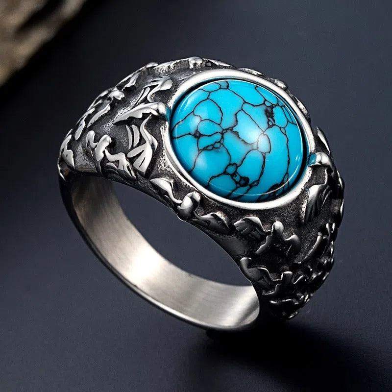 Retro titanium steel ring in steel colour, unisex design, showing surface detailing on solid metal band.