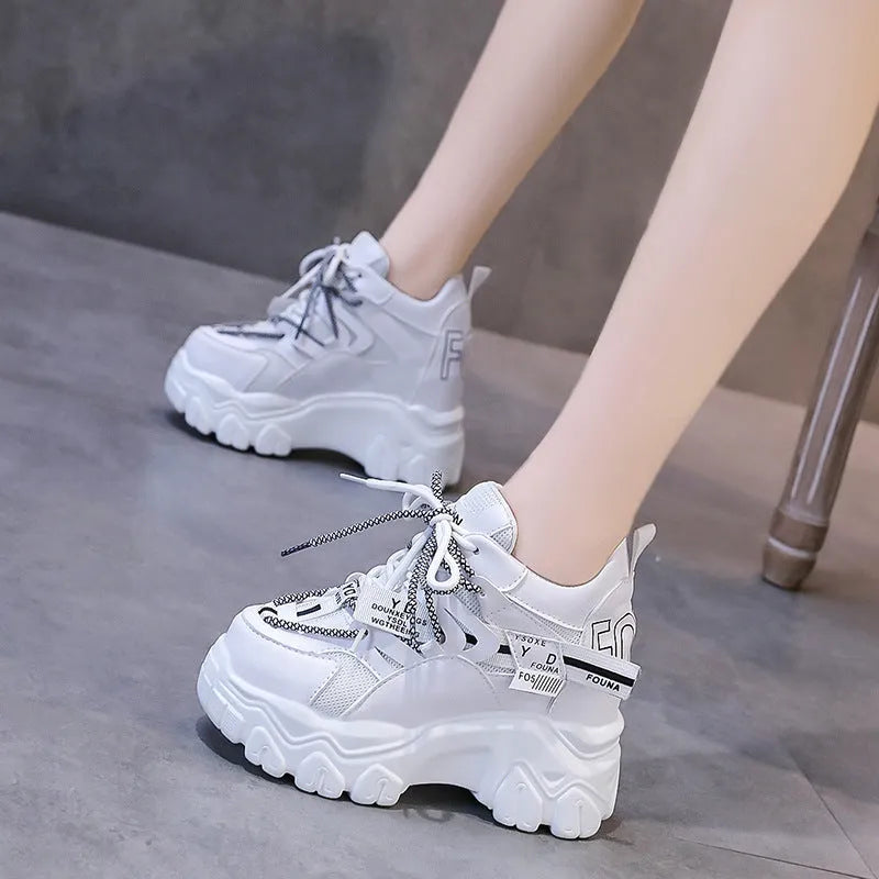 White women's mesh platform sports shoes with cross strap and a 6-8cm rubber sole.