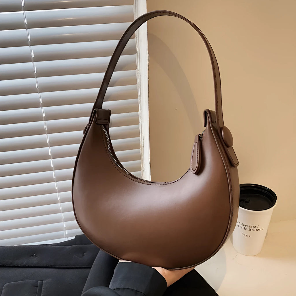 Retro women's dumpling-shaped shoulder bag in PU material with zippered compartment