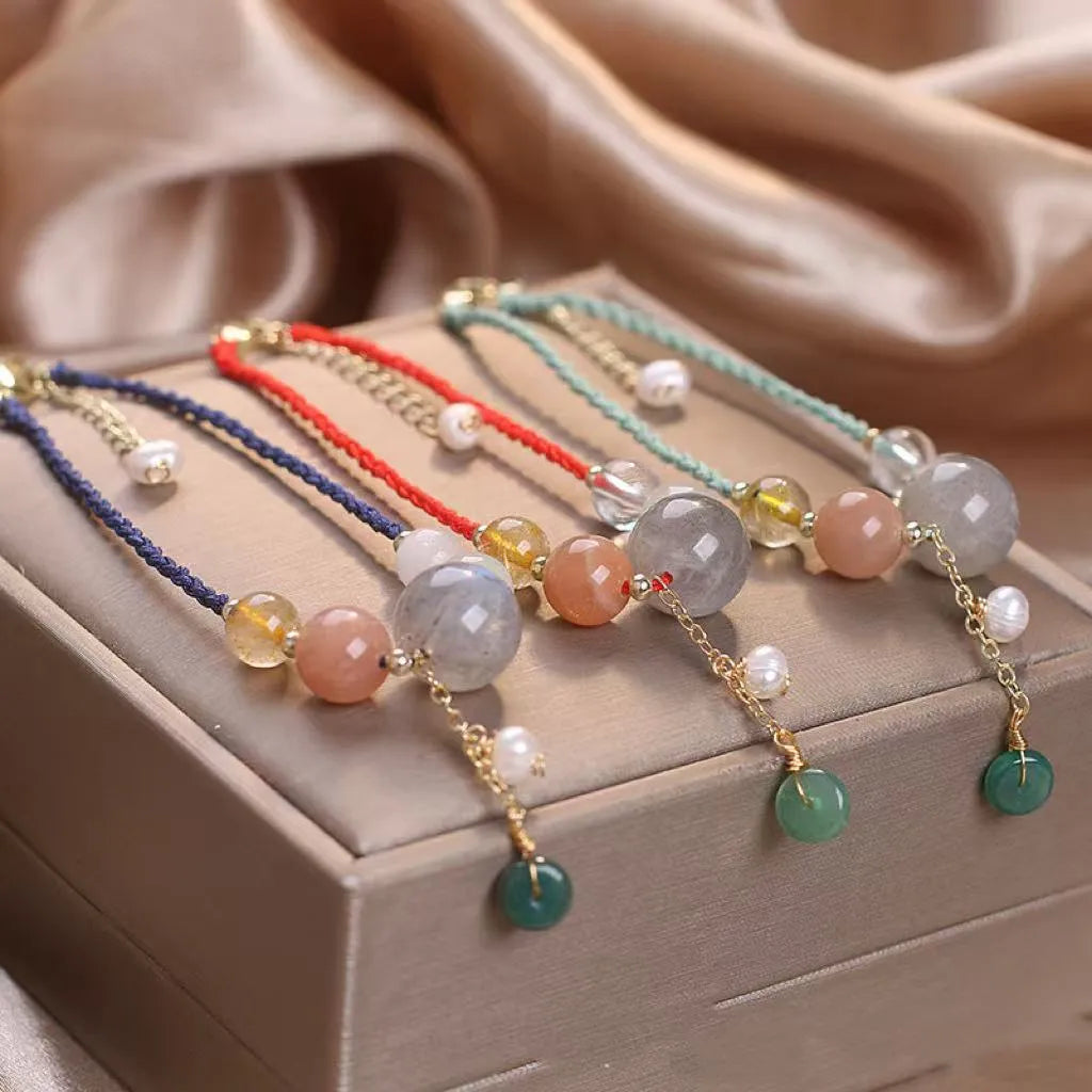 Hand-woven crystal peace buckle bracelet with sequins in blue, green, or red colour options