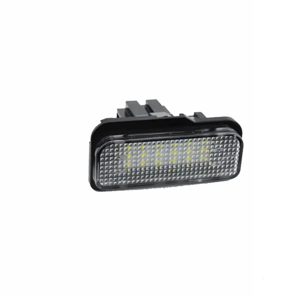 Mercedes Benz LED licence plate light unit showing white PC housing and 18 LED beads.