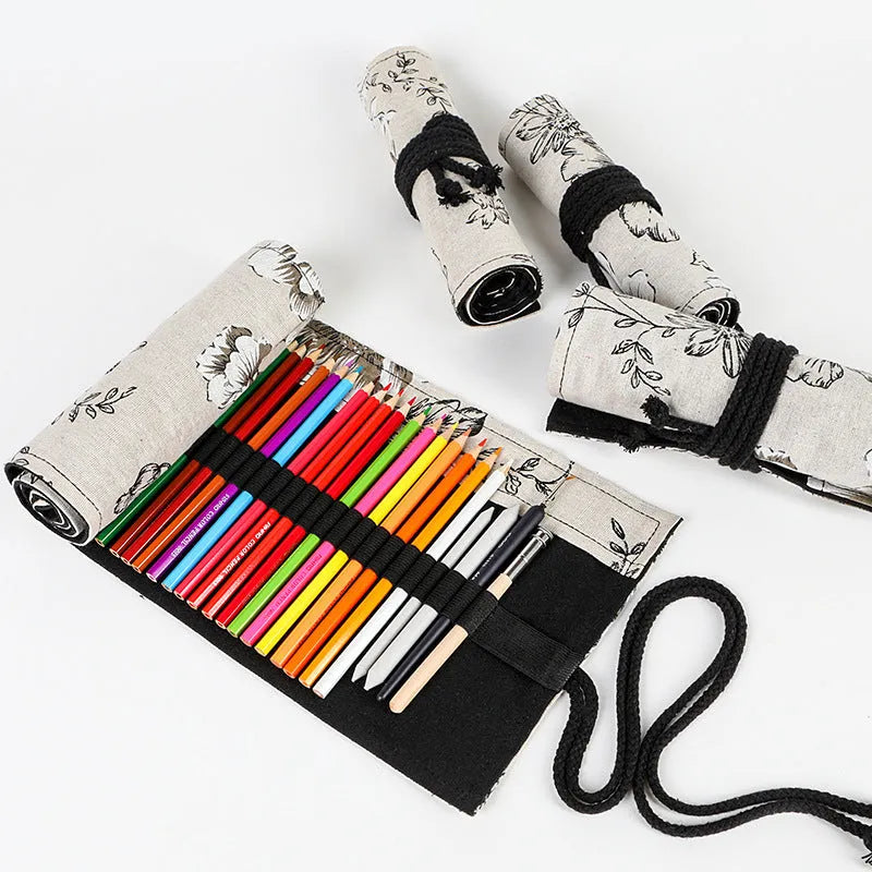 Black peony floral print canvas pencil roll bag unrolled to show 24 or 72 holes for pens.