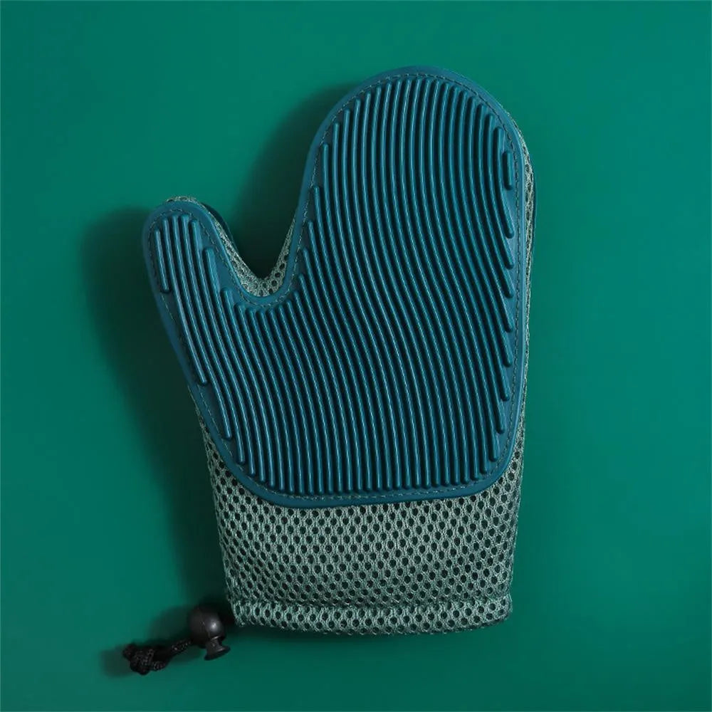 Right-hand pet grooming fur remover glove in dark blue, made from mesh and TPR materials.