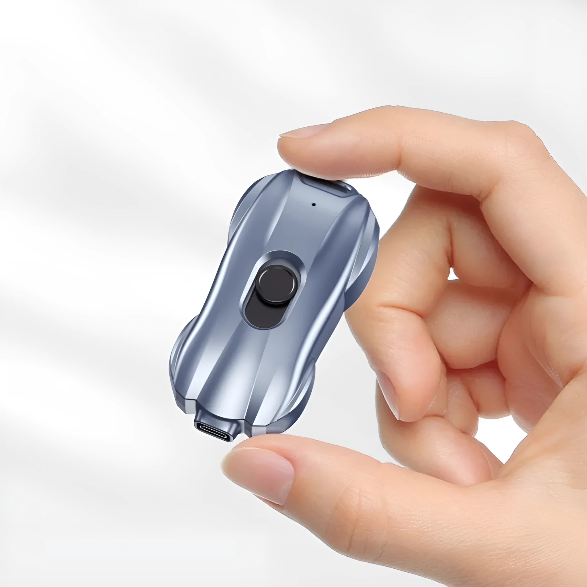 Mini plastic keychain power bank with 1500mAh capacity on a keyring.