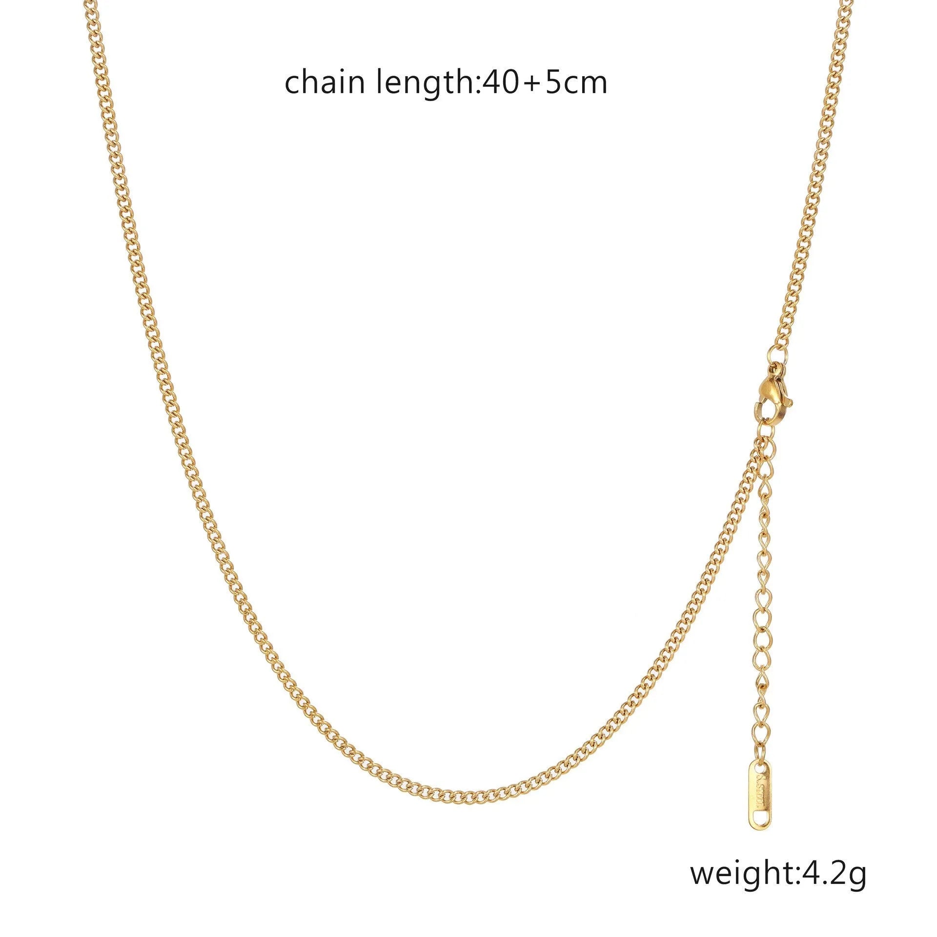 Women's stainless steel necklace with 18K gold hollow round pendant and O-link chain on neutral background