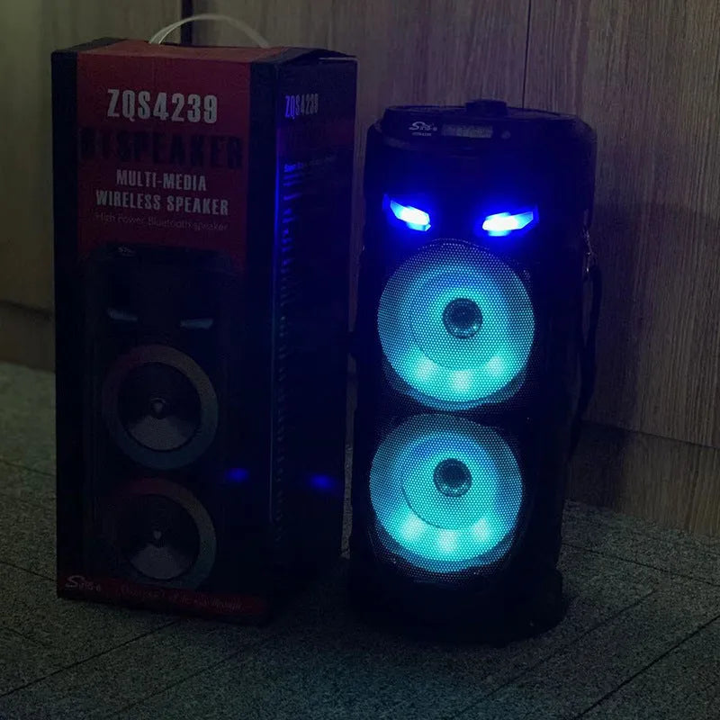 Black portable Bluetooth speaker with dual horn design and card slot