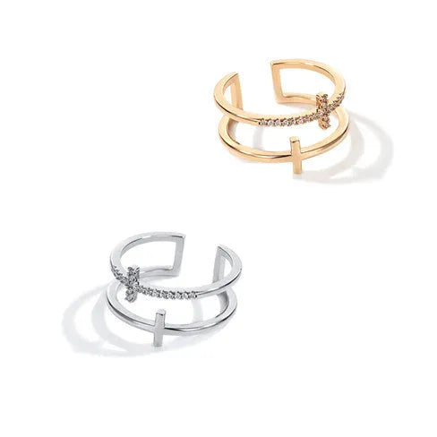 Adjustable copper ring with clear zircon stone in geometric setting, shown in gold electroplated finish