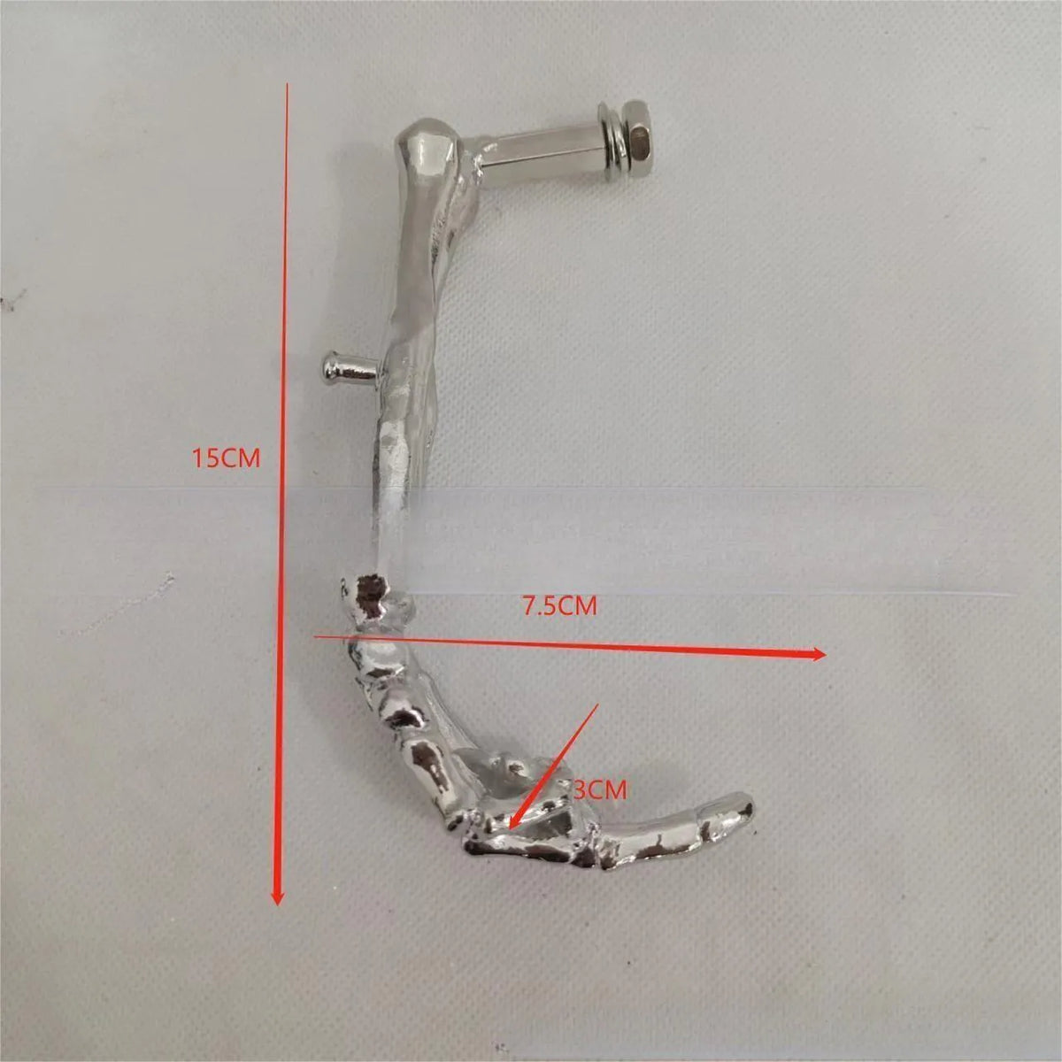 Alloy motorcycle support frame bracket fittings 15x7.5x3cm on solid background