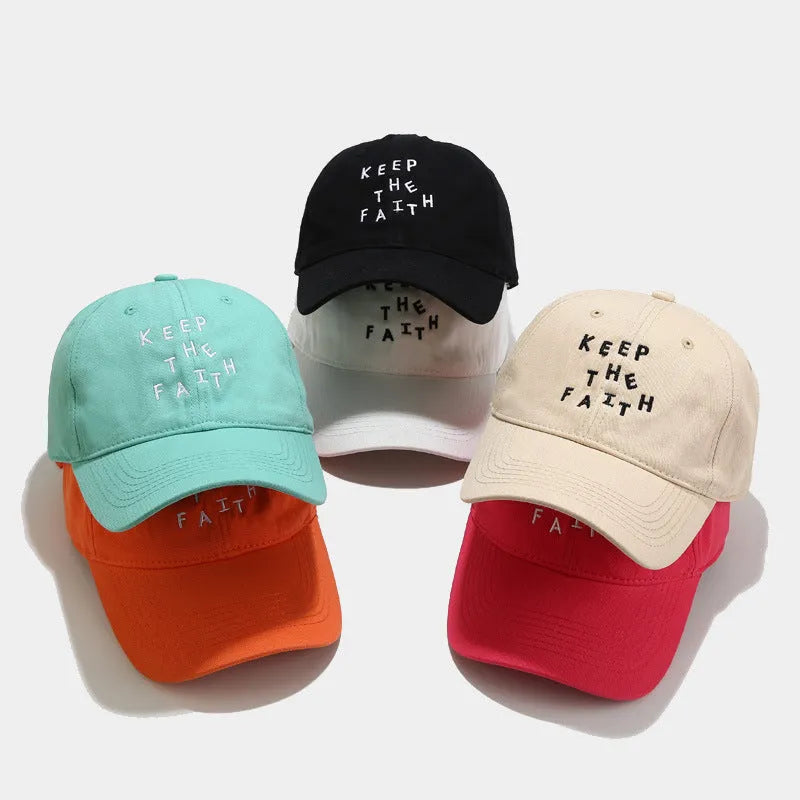 Men's beige cotton baseball cap with adjustable strap and dome crown on a white background.
