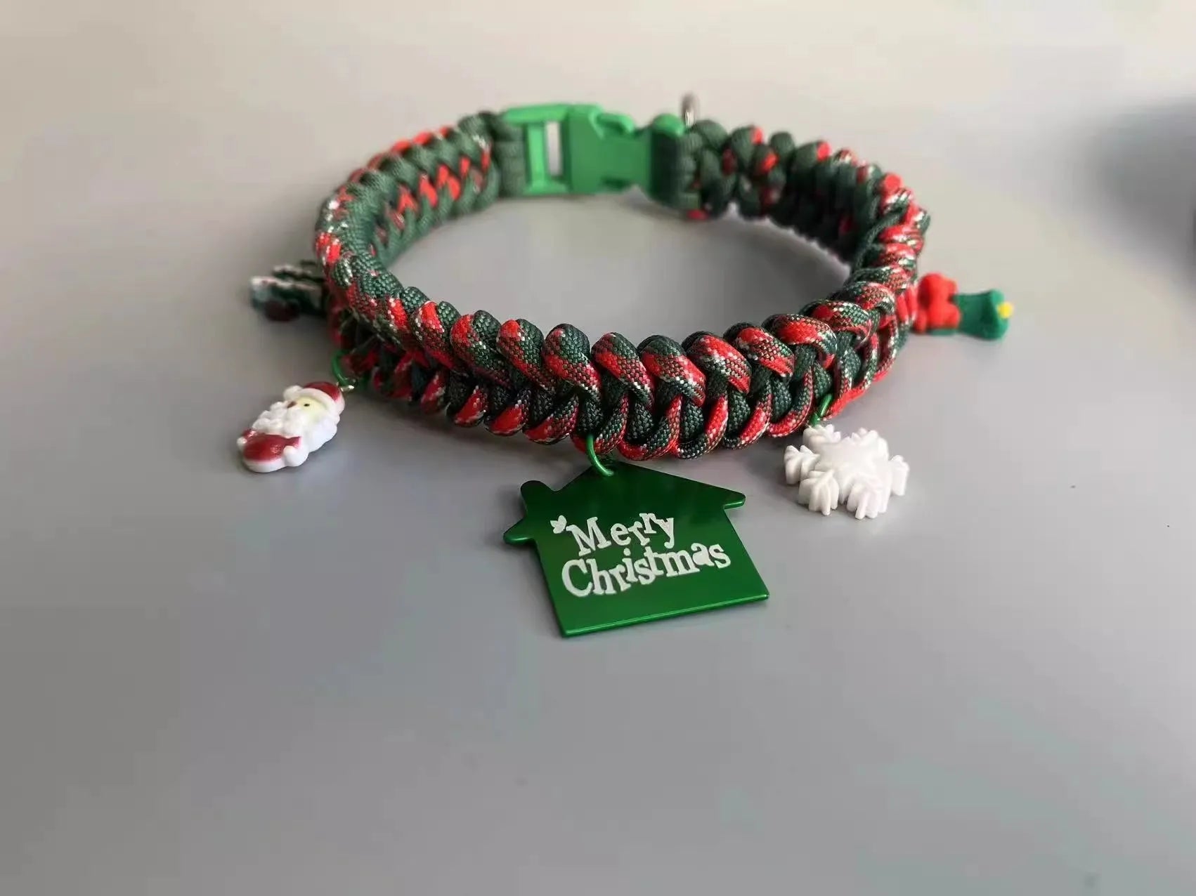 Green and red dog leash with metal P-chain, rope handle, and release buckle options