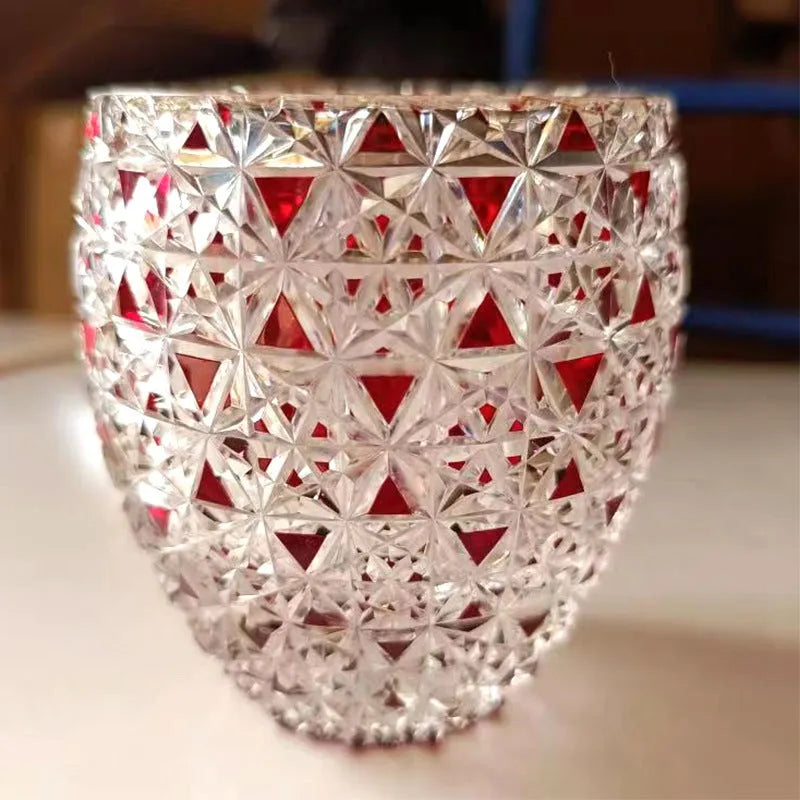 Japanese-style hand carved red crystal glass cup with cylindrical shape and carved pattern