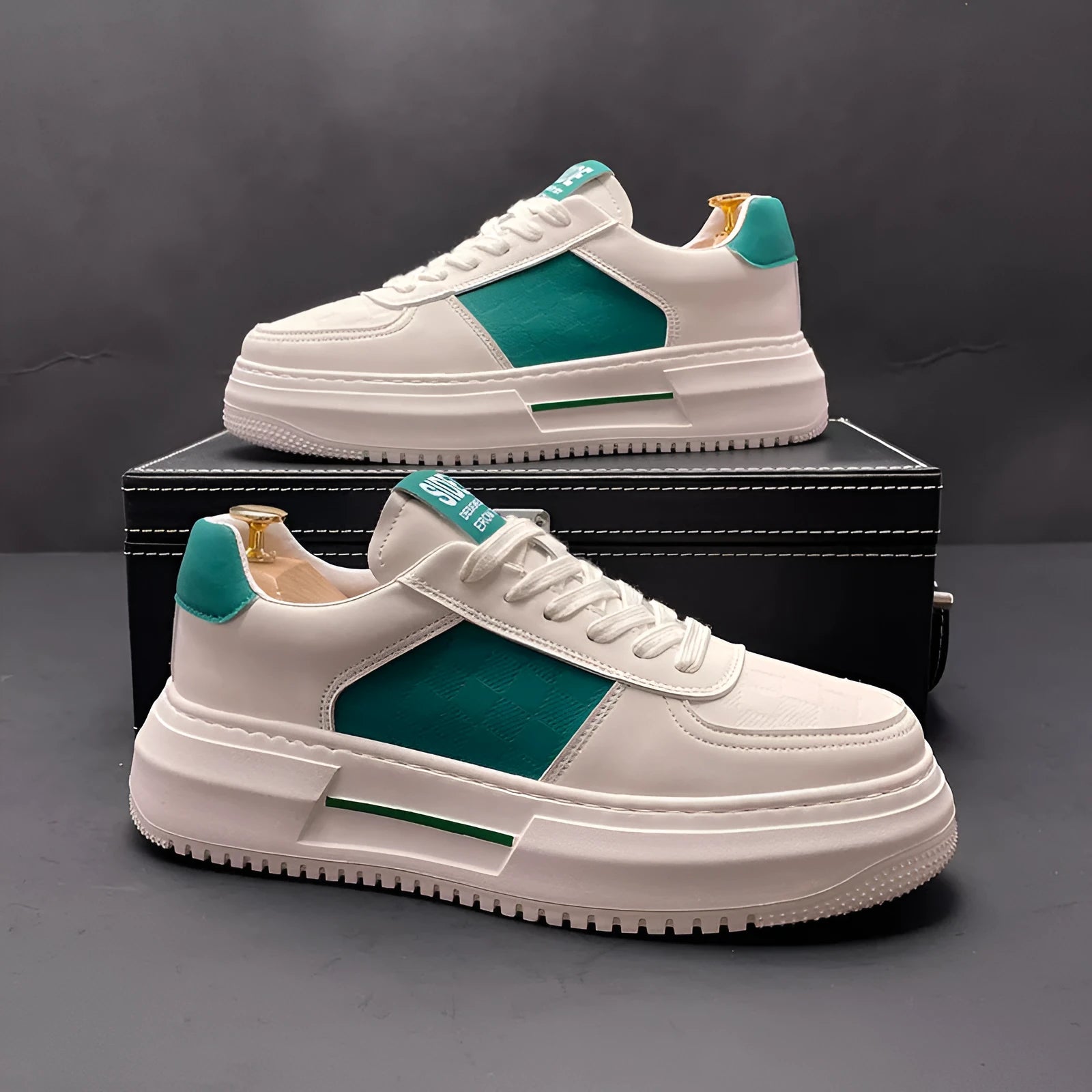 White, green and black sports casual shoes with cloth upper and rubber foam sole showing heel lift insert option