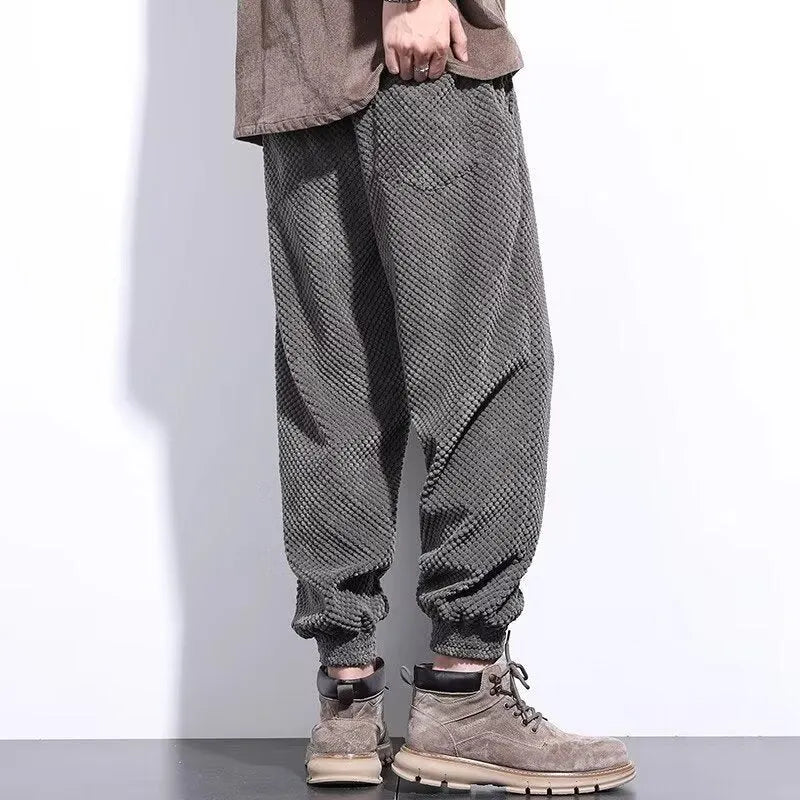 Men's grey ankle strap sweatpants with straight leg design and non-iron polyester blend fabric