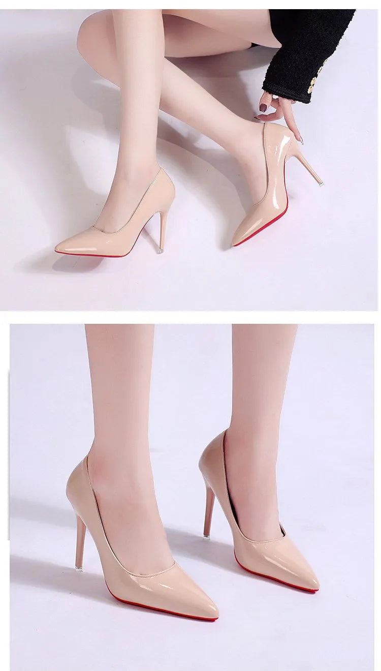 Women's black stiletto heel pump with pointed toe and shallow mouth opening on a white background.
