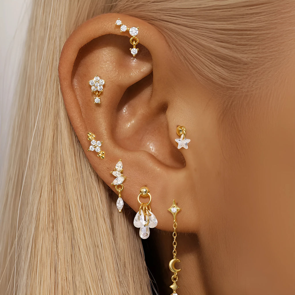 S925 sterling silver moon and star earrings with embedded diamond accents in a gold colour finish.