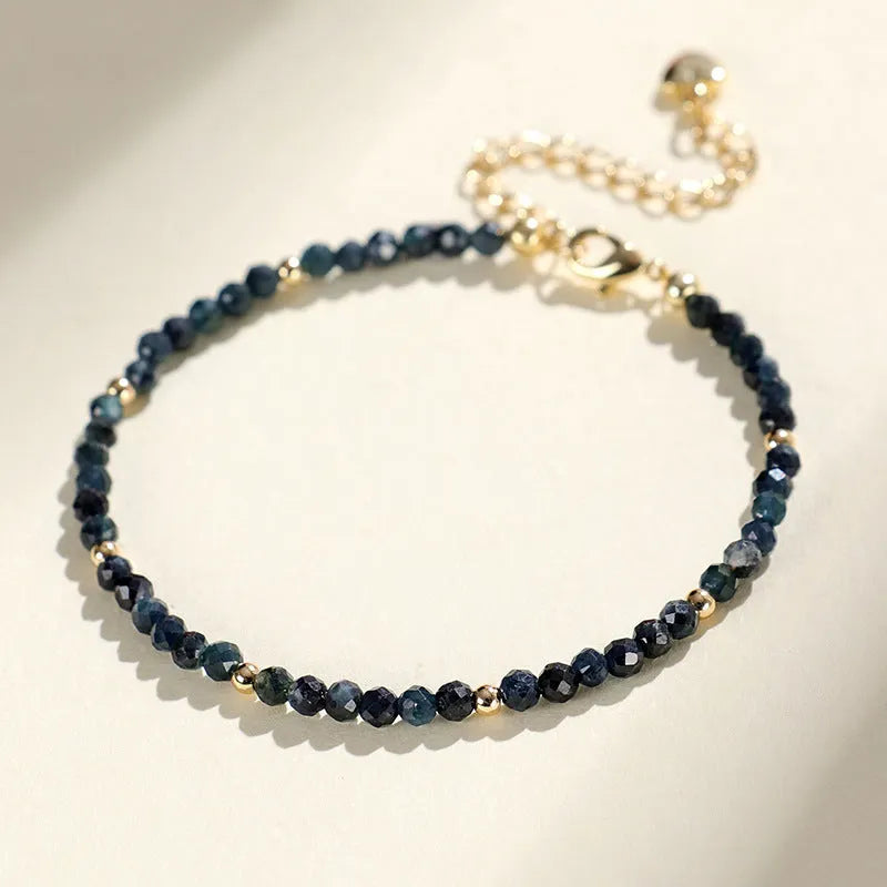 Blue tourmaline spacer bead bracelet with 3mm cut beads for women