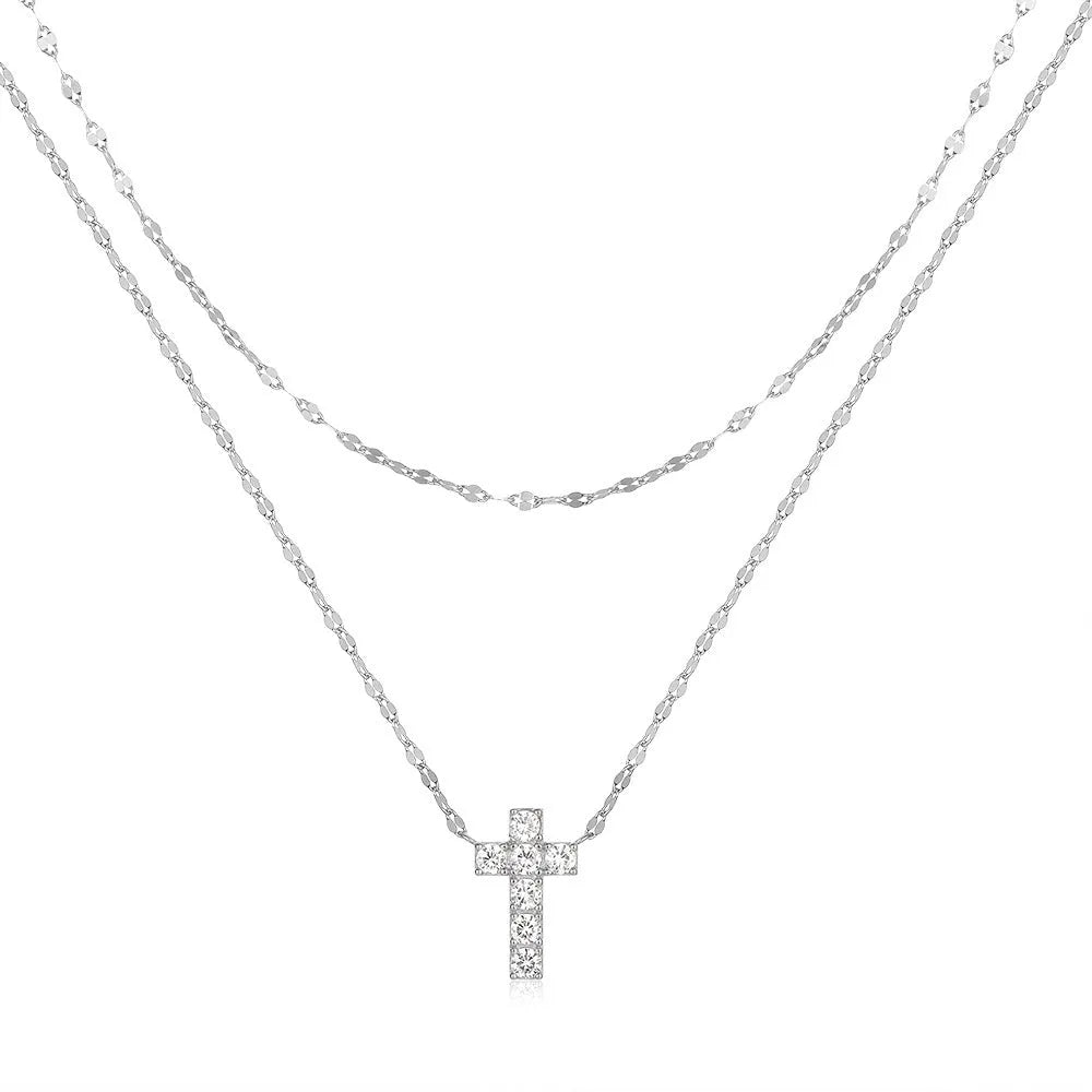 Sterling silver double layer cross pendant necklace with a clavicle chain in a gold tone finish.