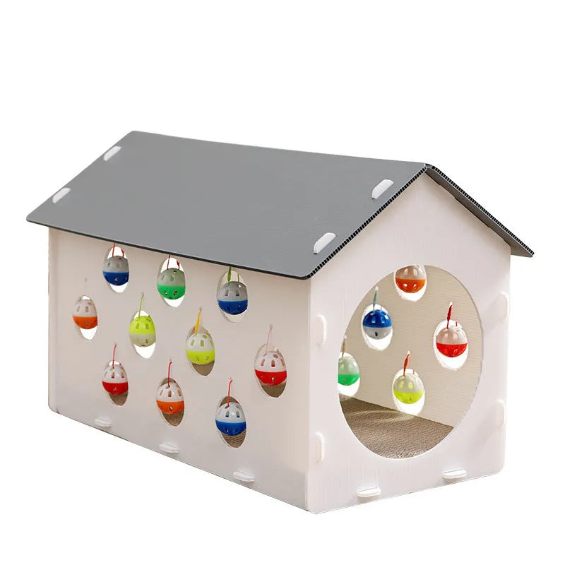 White plastic integrated cat scratch board with attached enclosed nest and curving tunnel toy for indoor cats.