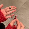 Moving Santa Claus long tassel asymmetric drop earrings for women with alloy finish