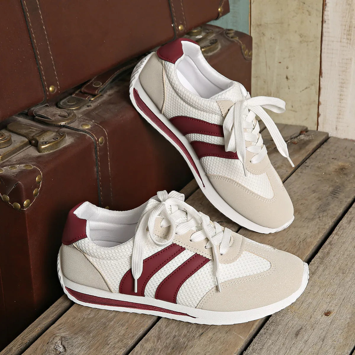 Women's wine red Cortez sneaker with cross-strap detail and breathable mesh upper