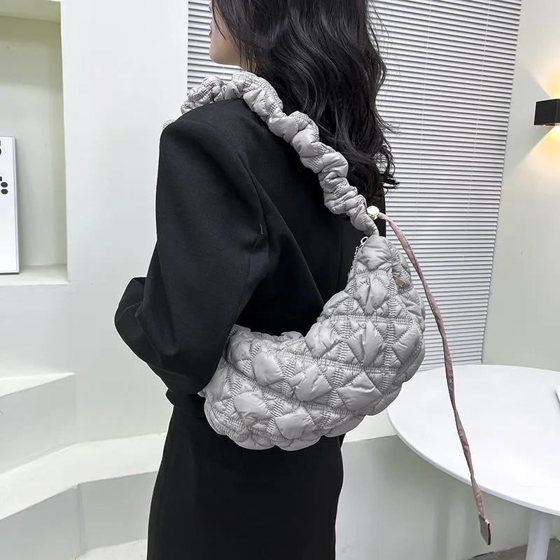 Women's casual nylon shoulder messenger bag in a solid colour with an adjustable long strap.