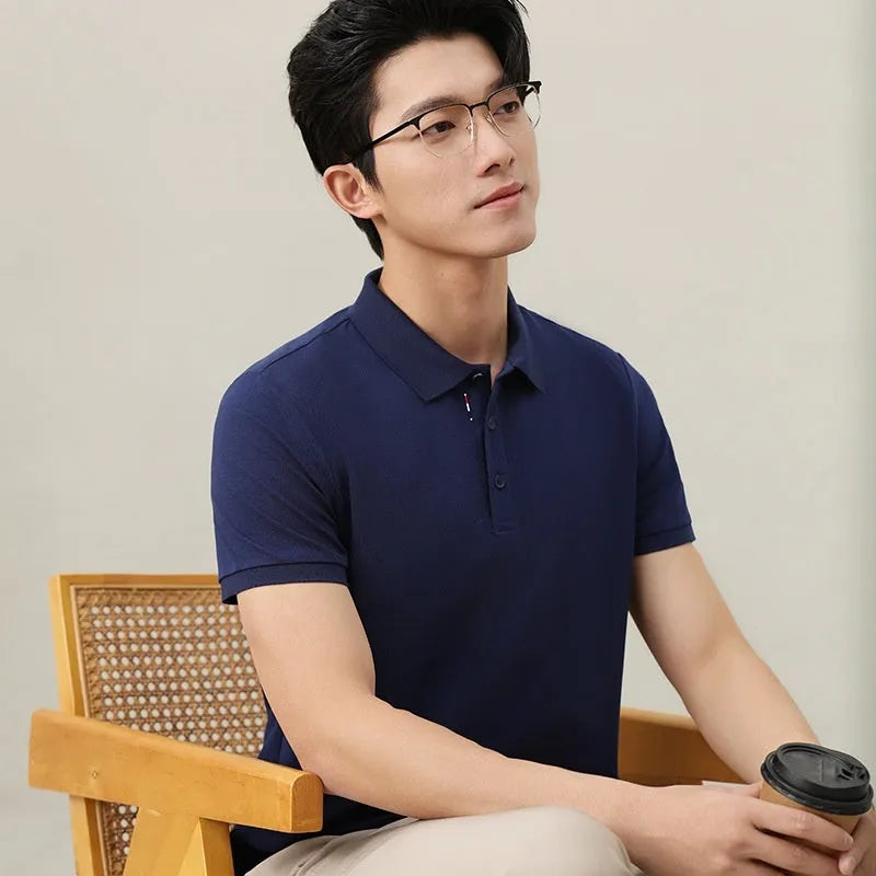 Solid colour cotton blend polo shirt for catering workwear in multiple colours and sizes.