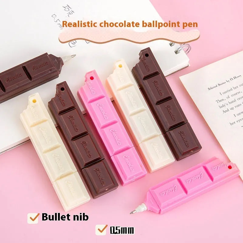 Chocolate bar themed novelty ballpoint pen with 0.5mm tip, shown in pink, beige, and brown refill colour options.