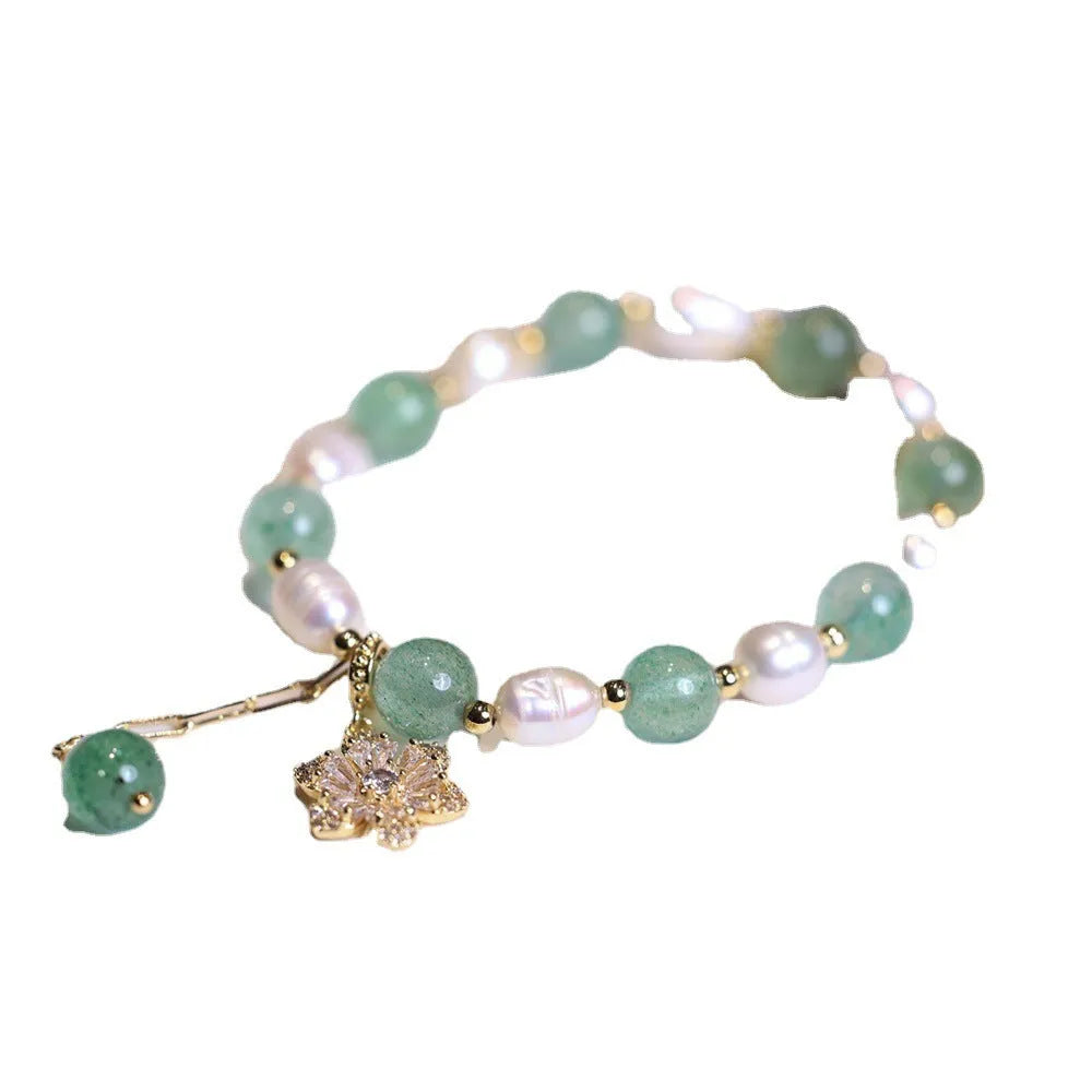 Green freshwater pearl bracelet with Chinese knot design and peace buckle closure