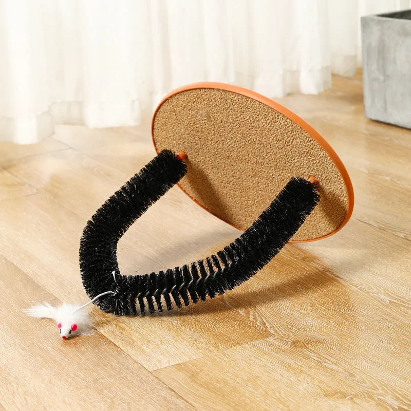 Black plastic arch-shaped cat grooming device with scratching cloth and attached mouse toy
