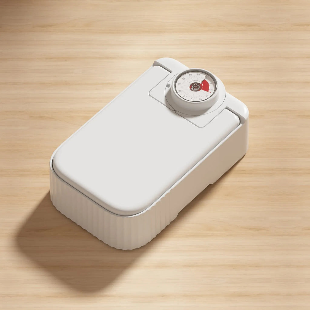 White timed pet feeder with visual alarm display and separate ice crystal box for freshness.