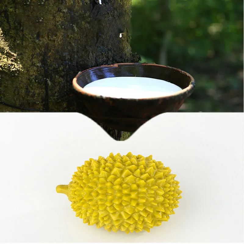 Durian-shaped dog chew toy in yellow with squeaker and tooth cleaning ridges