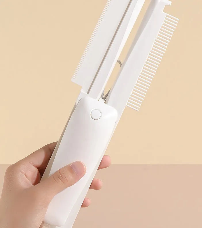 Pink and white ABS plastic pet grooming brush for dogs and cats on flat surface
